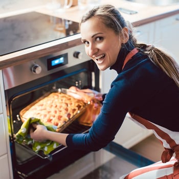 woman dish oven